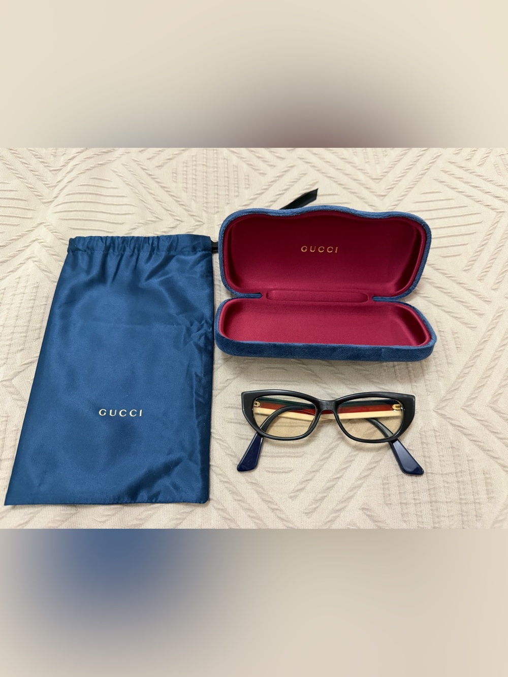 Gucci Black Cat-Eye Glasses with Blue-Red-White Stripe Temples